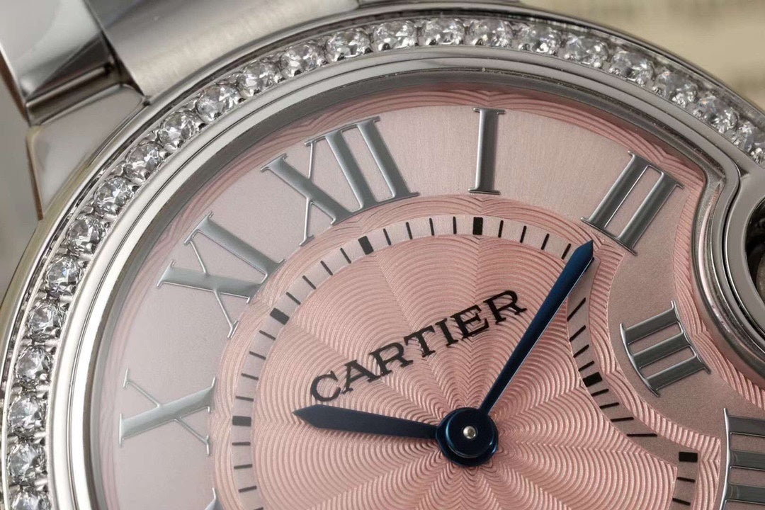 SILVER-TONE ROUND DIAL WATCH WITH PINK FACE