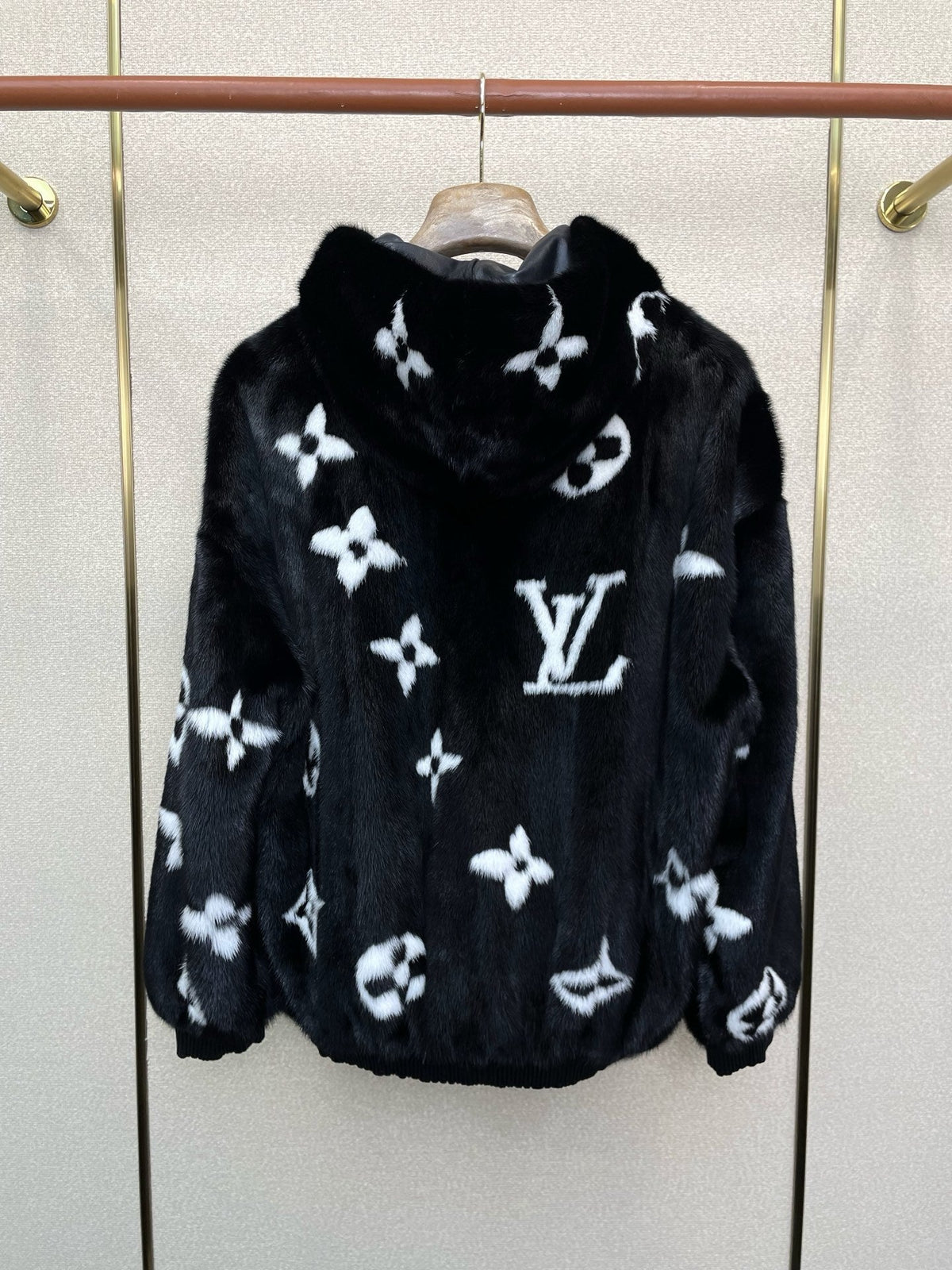 BLACK FAUX FUR HOODED JACKET WITH CONTRAST PATTERN