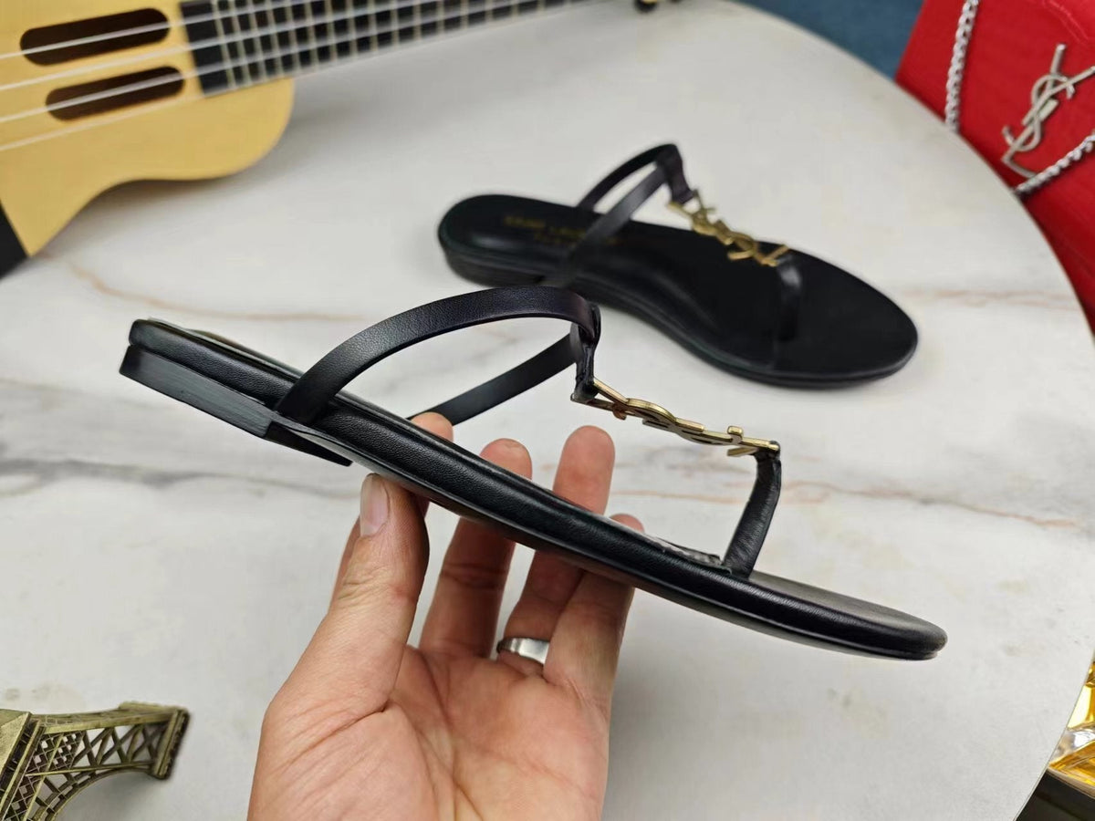 BLACK FLAT SANDALS WITH GOLD ACCENT