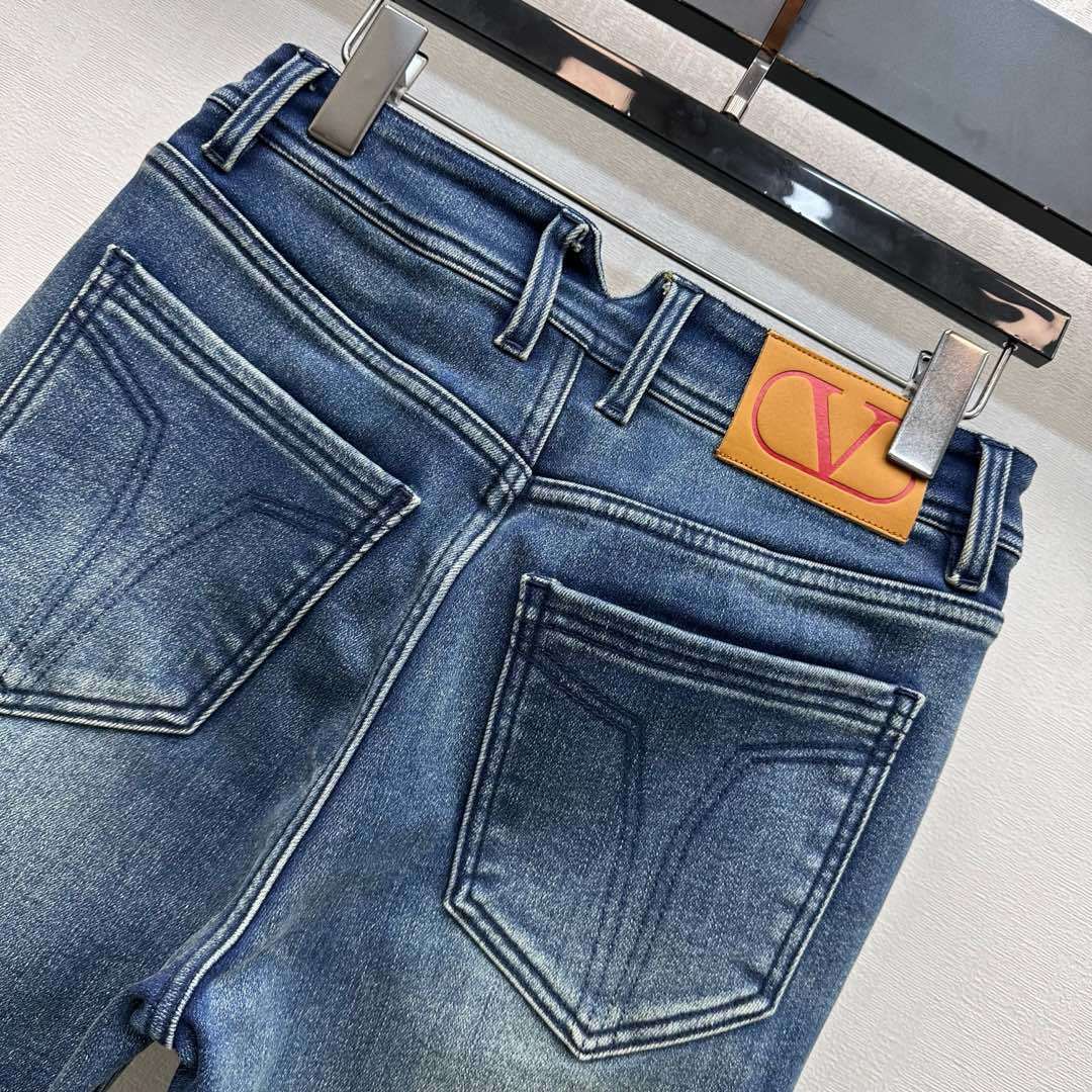FLARED LEG VINTAGE WASH DENIM JEANS