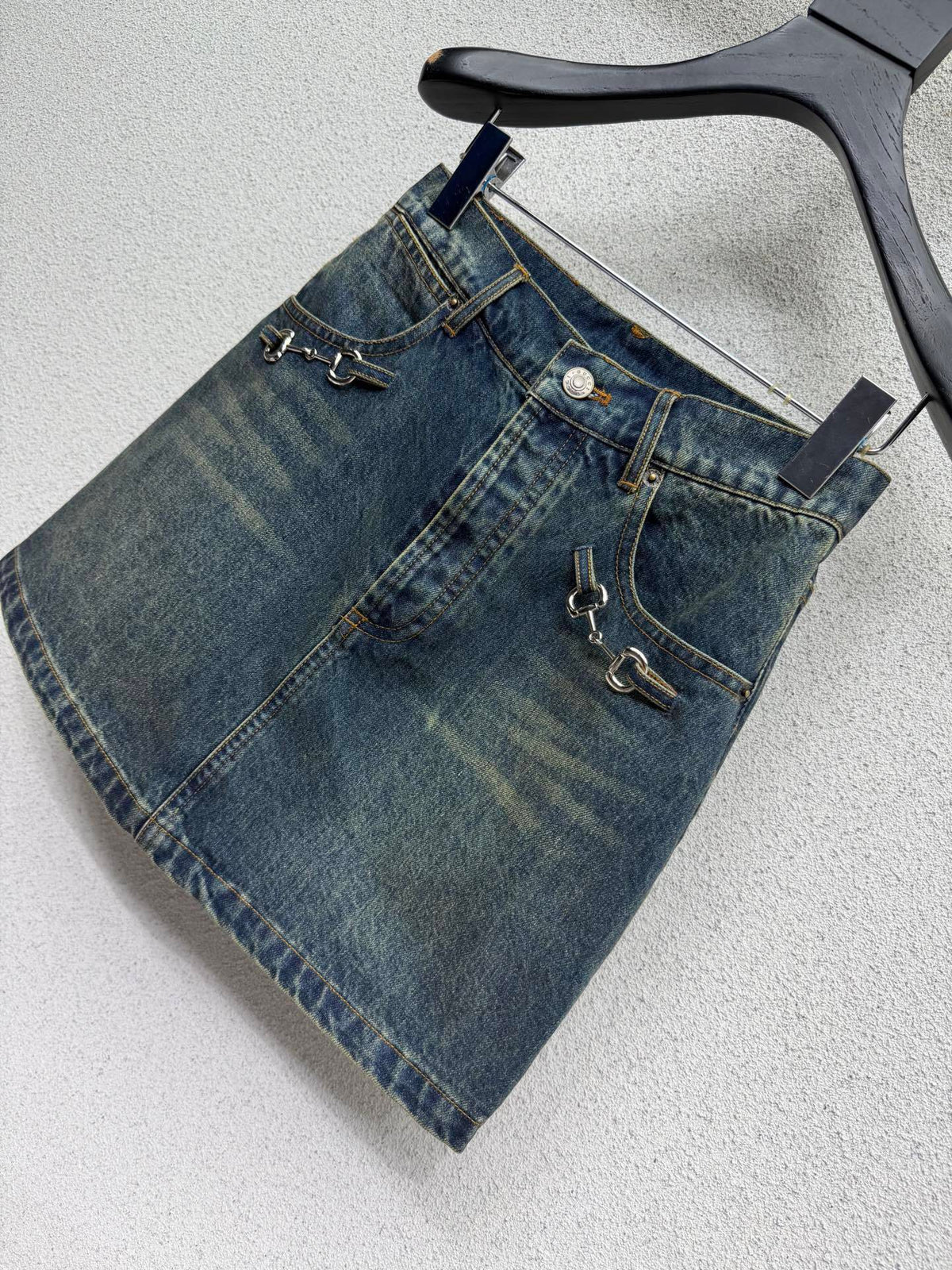 DARK BLUE DENIM MINI SKIRT WITH METAL DETAIL