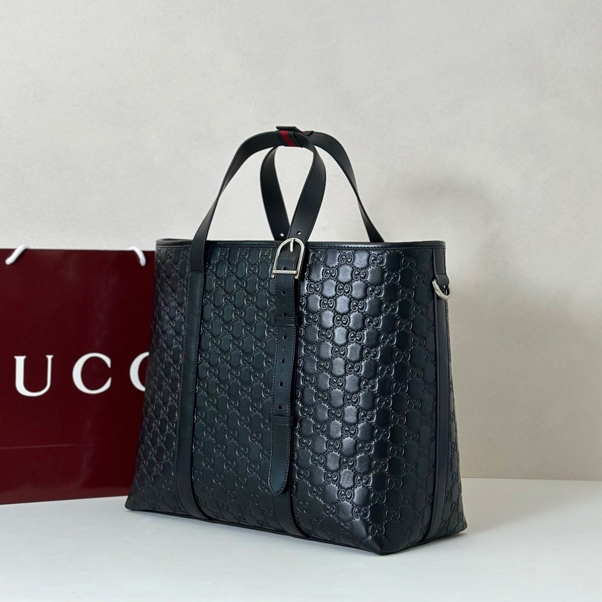 EMBOSSED LEATHER TOTE BAG