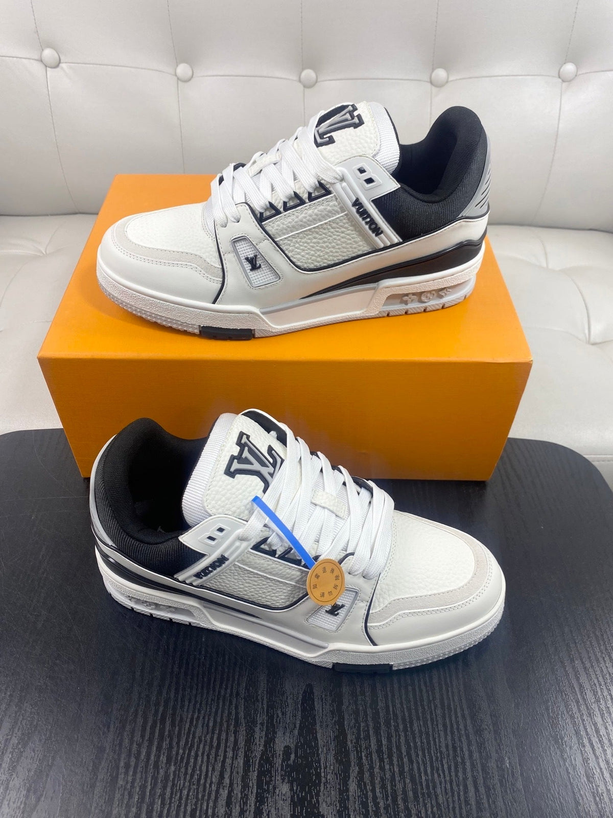 WHITE LOW-TOP SNEAKERS WITH BLACK ACCENTS