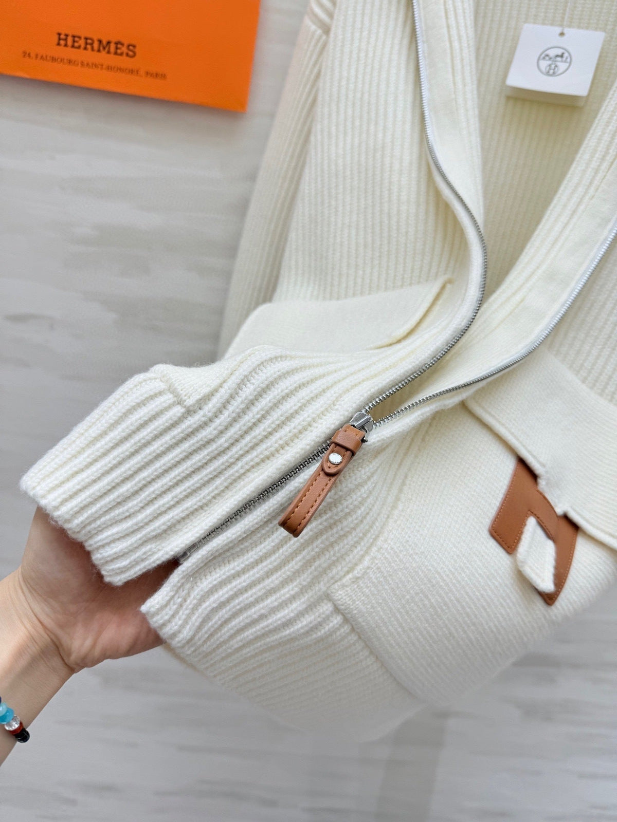 IVORY RIBBED KNIT ZIP CARDIGAN WITH FRONT FLAP POCKETS