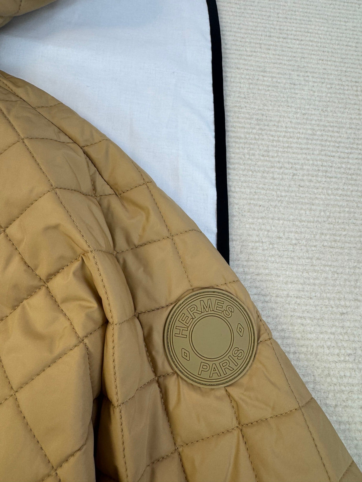 QUILTED HOODED JACKET WITH FRONT FLAP CLOSURE