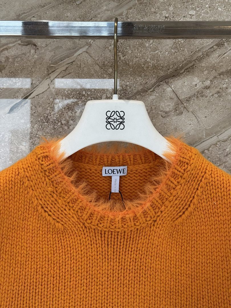 TEXTURED KNIT SLEEVELESS SWEATER
