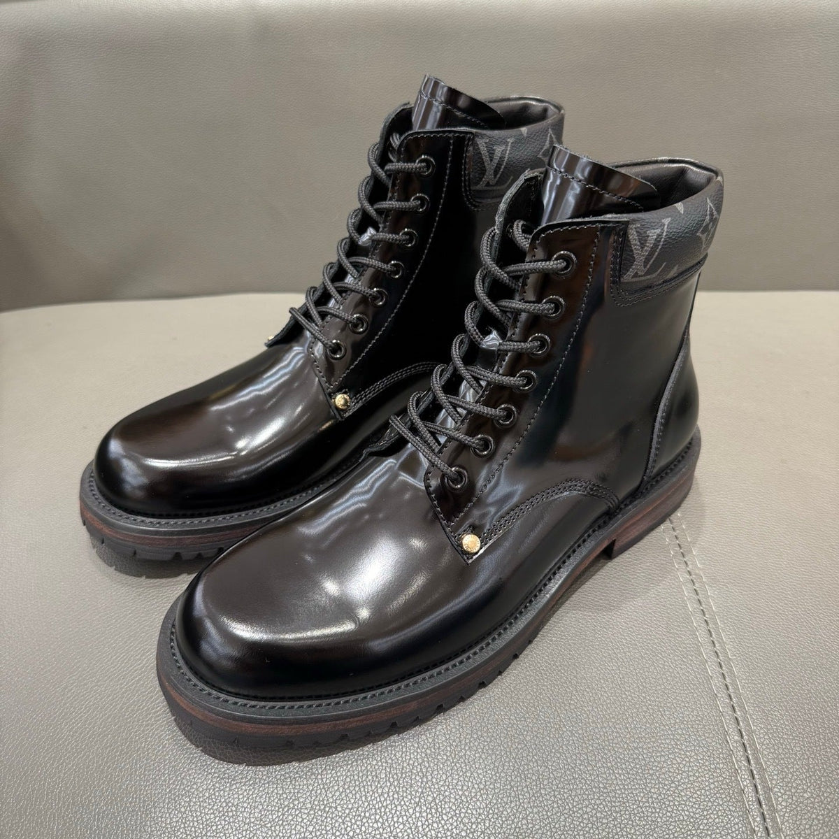 BLACK LEATHER MONOGRAM LACE-UP BOOTS
