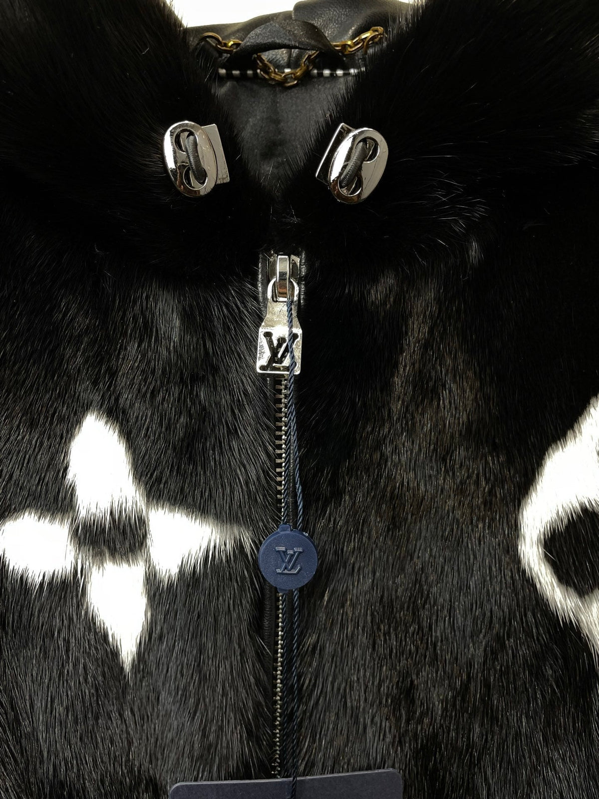 BLACK FAUX FUR HOODED JACKET WITH CONTRAST PATTERN