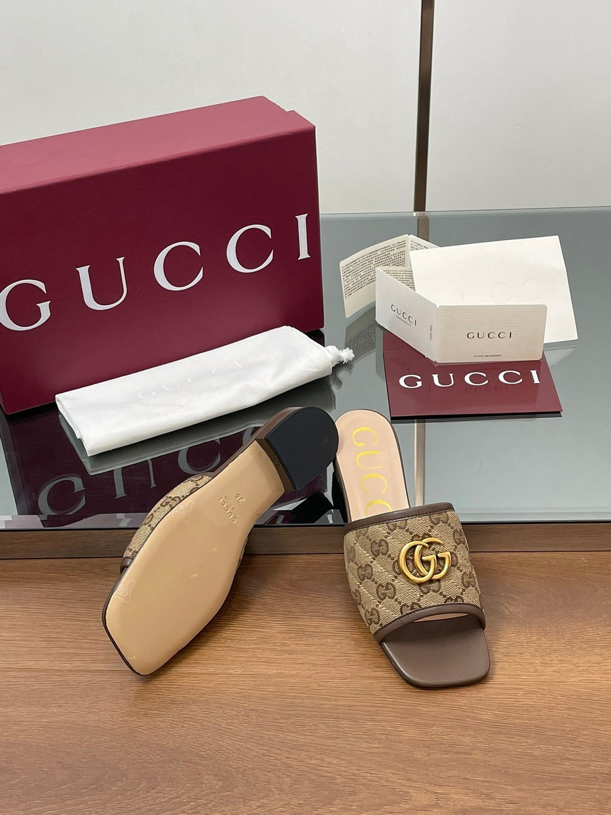 BROWN MONOGRAM FLAT SLIDES