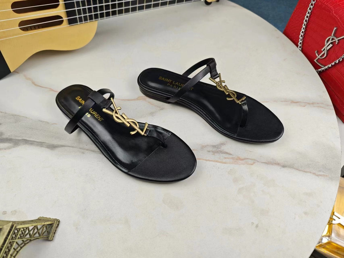 BLACK FLAT SANDALS WITH GOLD ACCENT