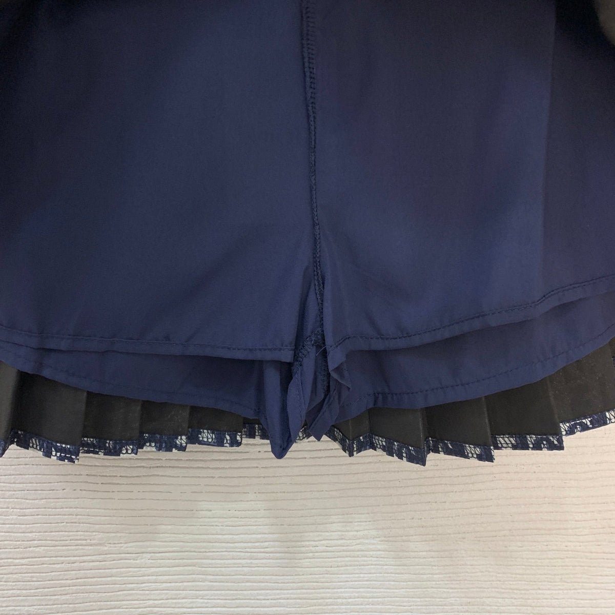 BLUE MONOGRAM PLEATED MINI SKIRT