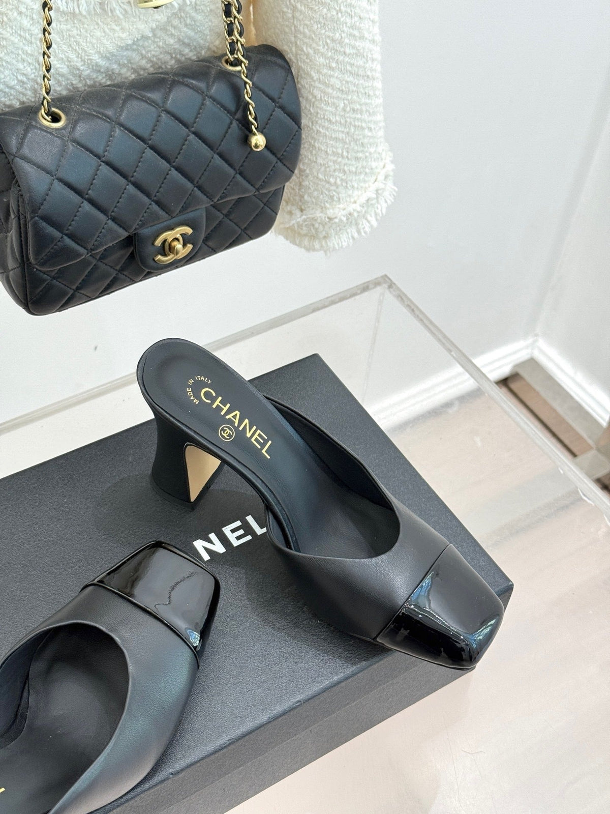 BLACK LEATHER CAP-TOE MULE HEELS WITH GOLD DETAIL