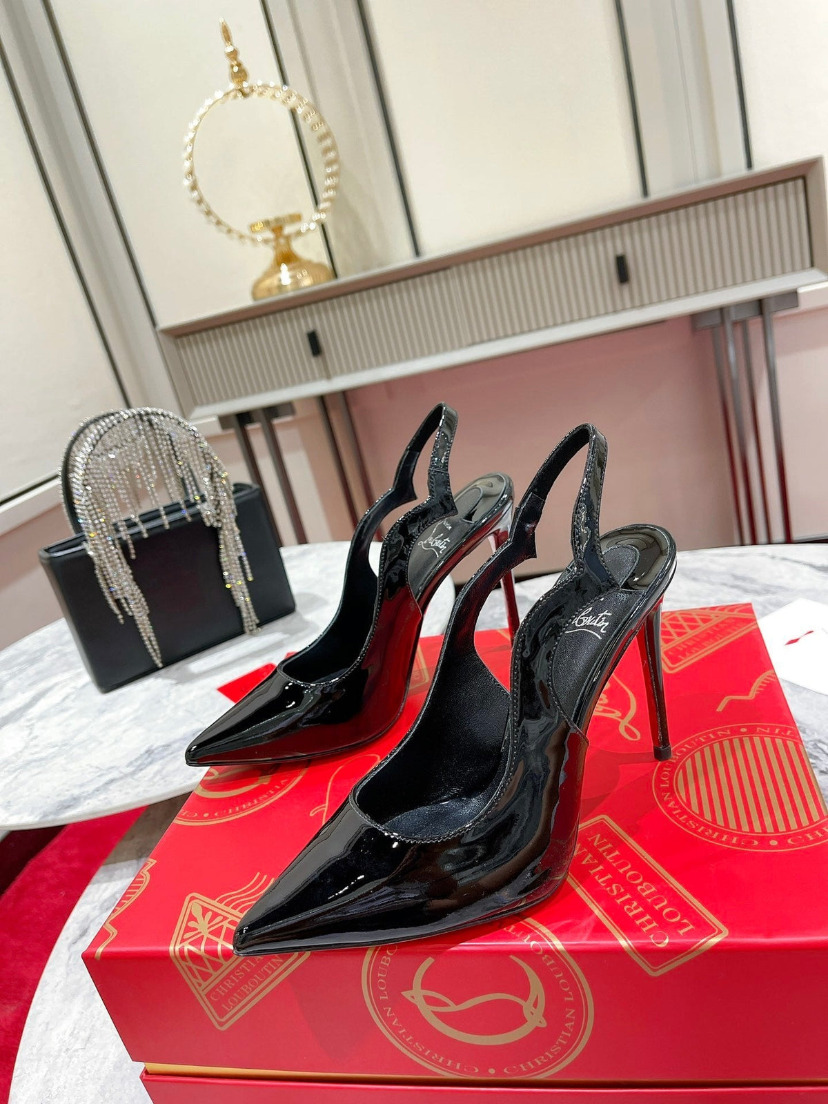 BLACK PATENT SCALLOPED SLINGBACK HEELS