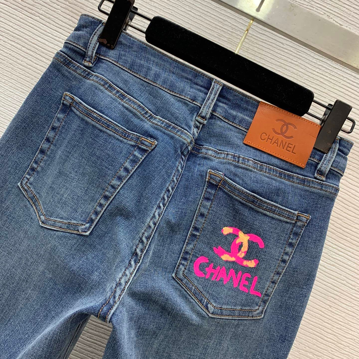 HIGH-WAIST FLARED DENIM JEANS