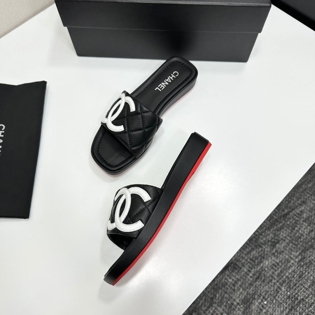 QUILTED LOGO PLATFORM SLIDE SANDALS