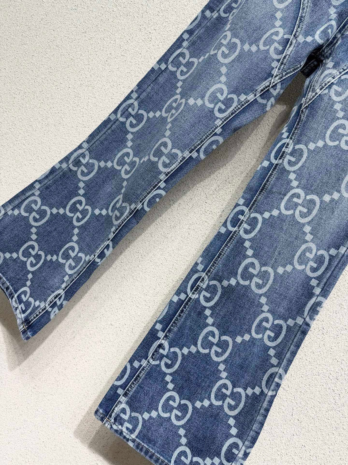 MONOGRAM PRINT FLARED DENIM JEANS