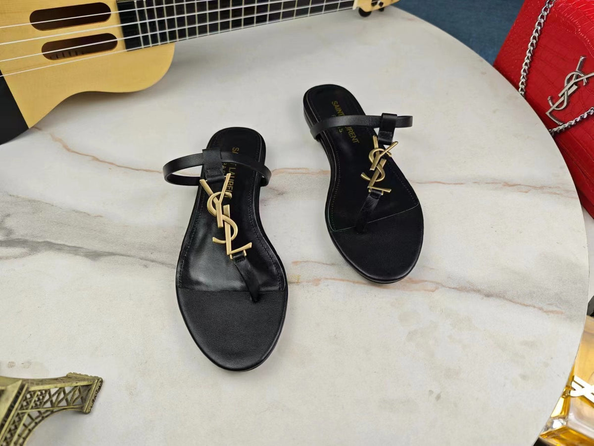 BLACK FLAT SANDALS WITH GOLD ACCENT
