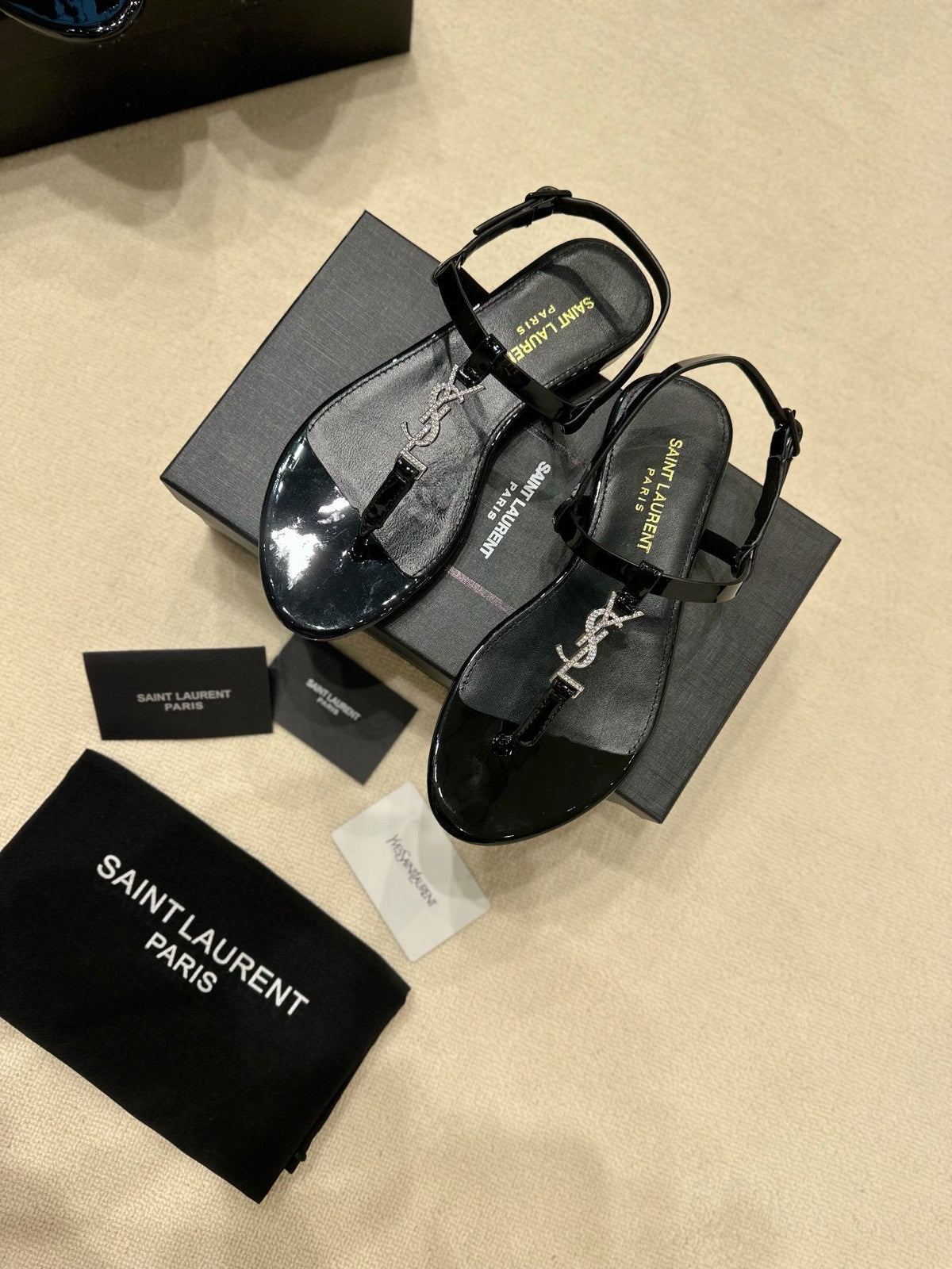 BLACK STRAPPY FLAT SANDALS WITH CRYSTAL DETAIL
