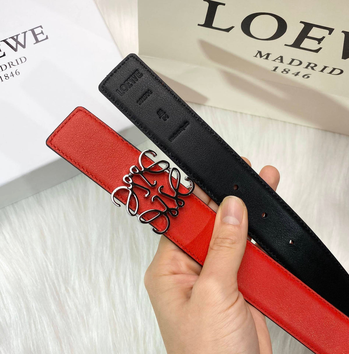 RED LEATHER BELT WITH SILVER ANAGRAM BUCKLE