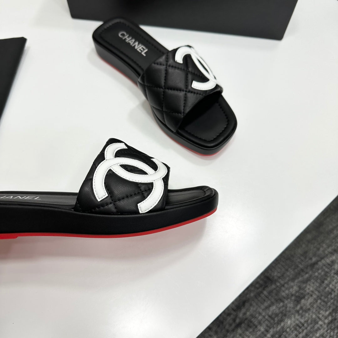 QUILTED LOGO PLATFORM SLIDE SANDALS