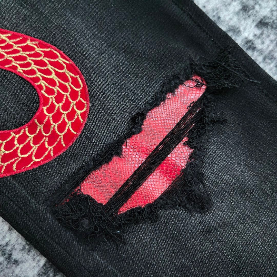 SNAKE GRAPHIC DISTRESSED SKINNY JEANS