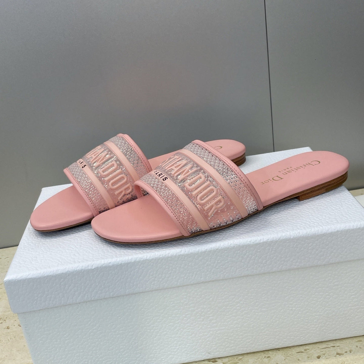 PINK LOGO EMBOSSED SLIDE SANDALS