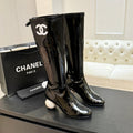 BLACK PATENT KNEE-HIGH BOOTS WITH SCULPTURAL BALL HEEL