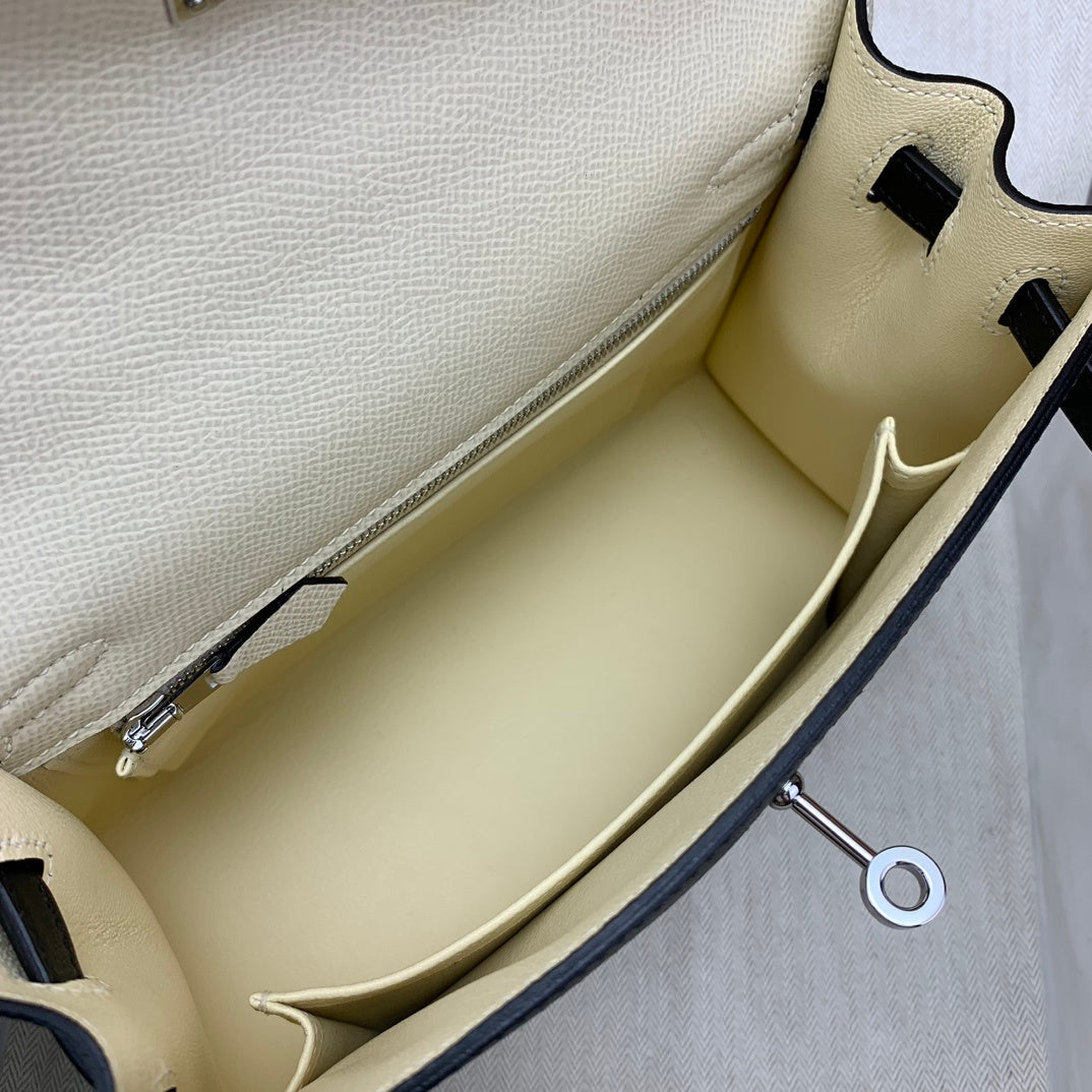 BLACK CREAM HANDBAG
