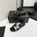 QUILTED LOGO PLATFORM SLIDE SANDALS