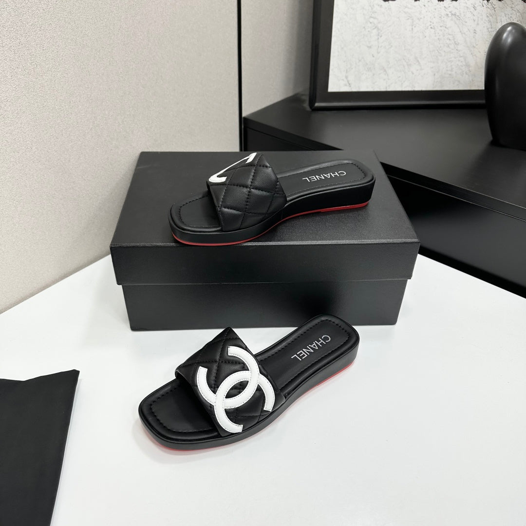QUILTED LOGO PLATFORM SLIDE SANDALS