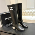 BLACK LEATHER KNEE-HIGH BOOTS WITH SCULPTURAL HEEL