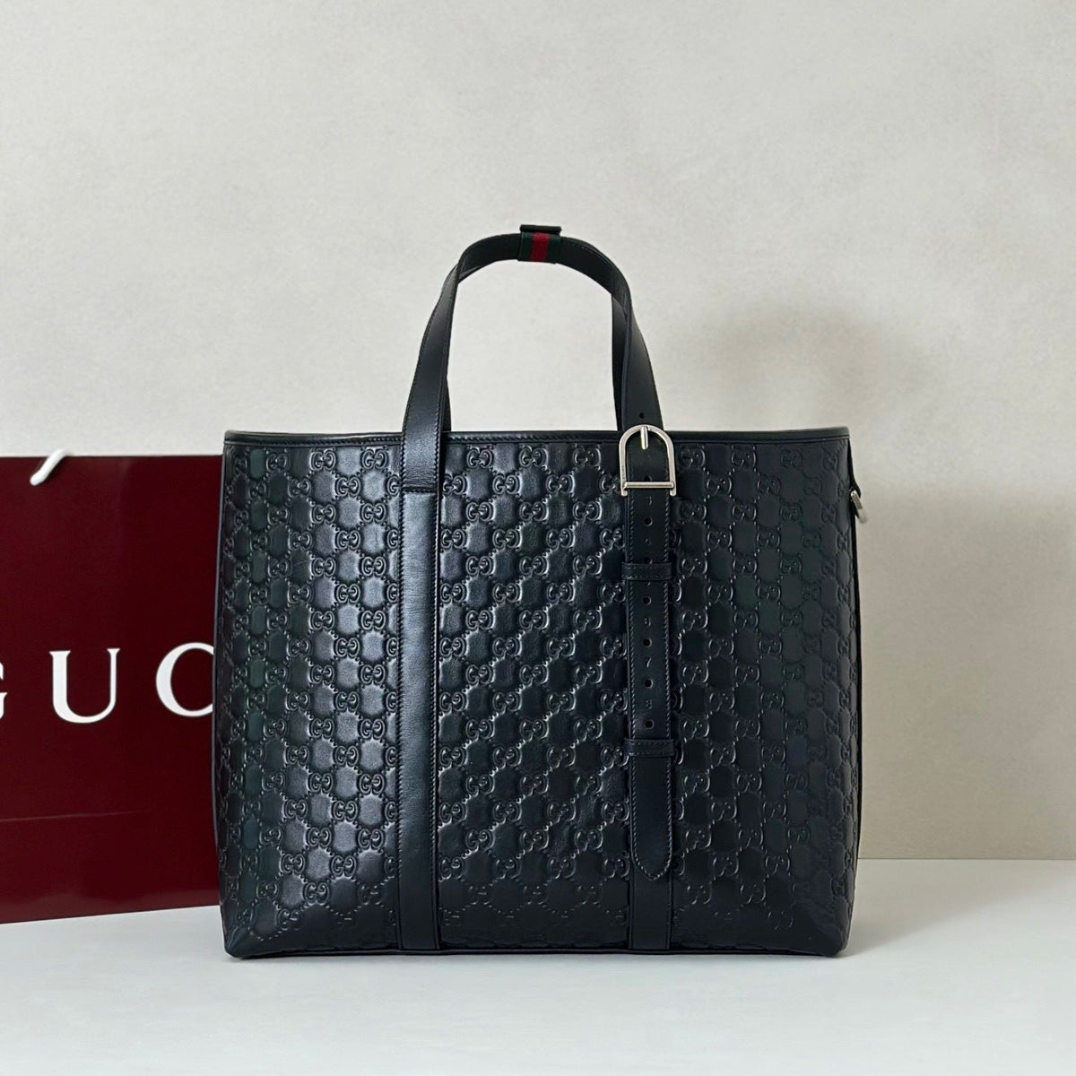 EMBOSSED LEATHER TOTE BAG