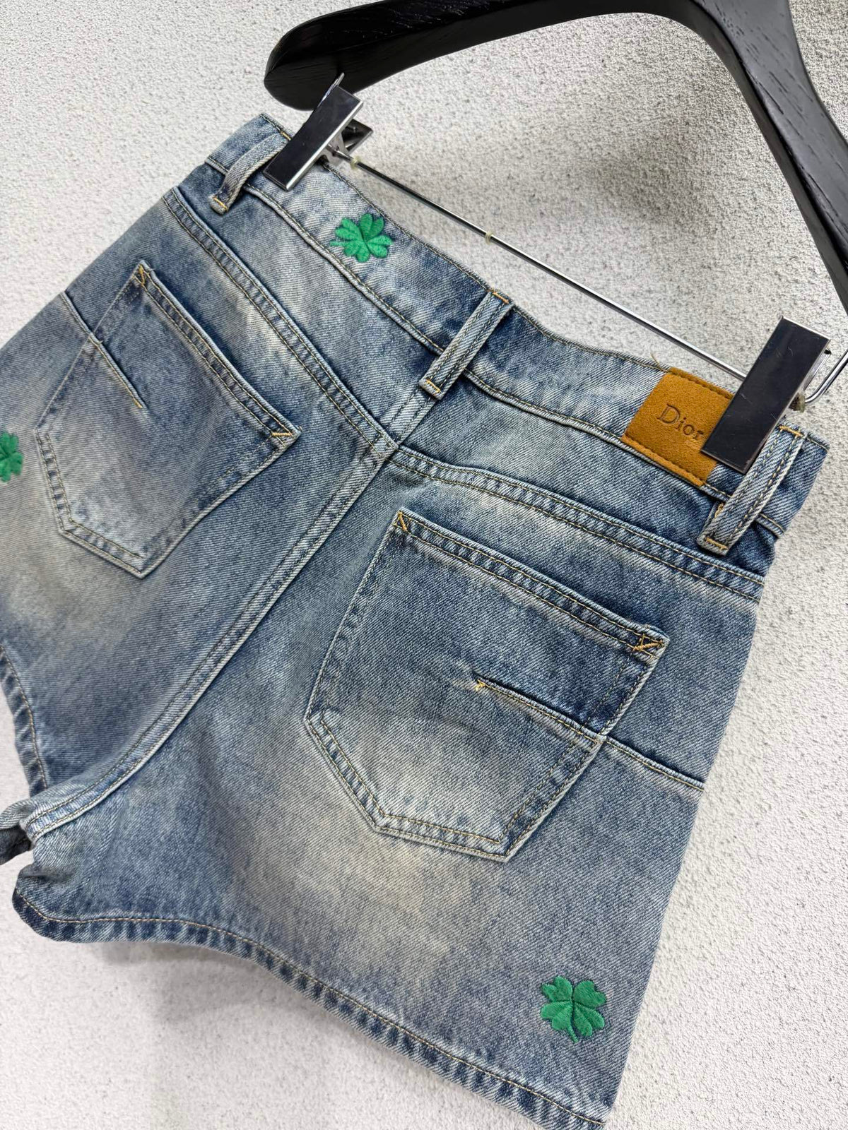 BLUE DENIM SHORTS WITH FLORAL EMBROIDERY