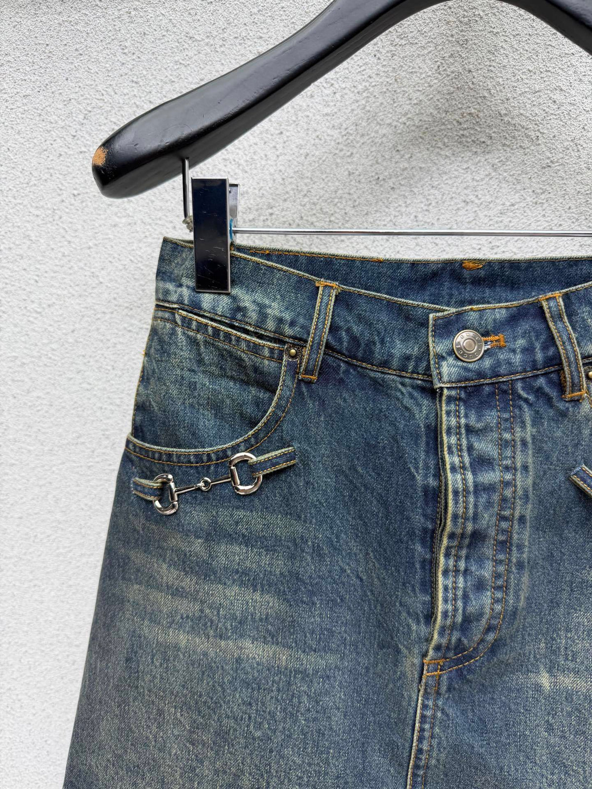 DARK BLUE DENIM MINI SKIRT WITH METAL DETAIL