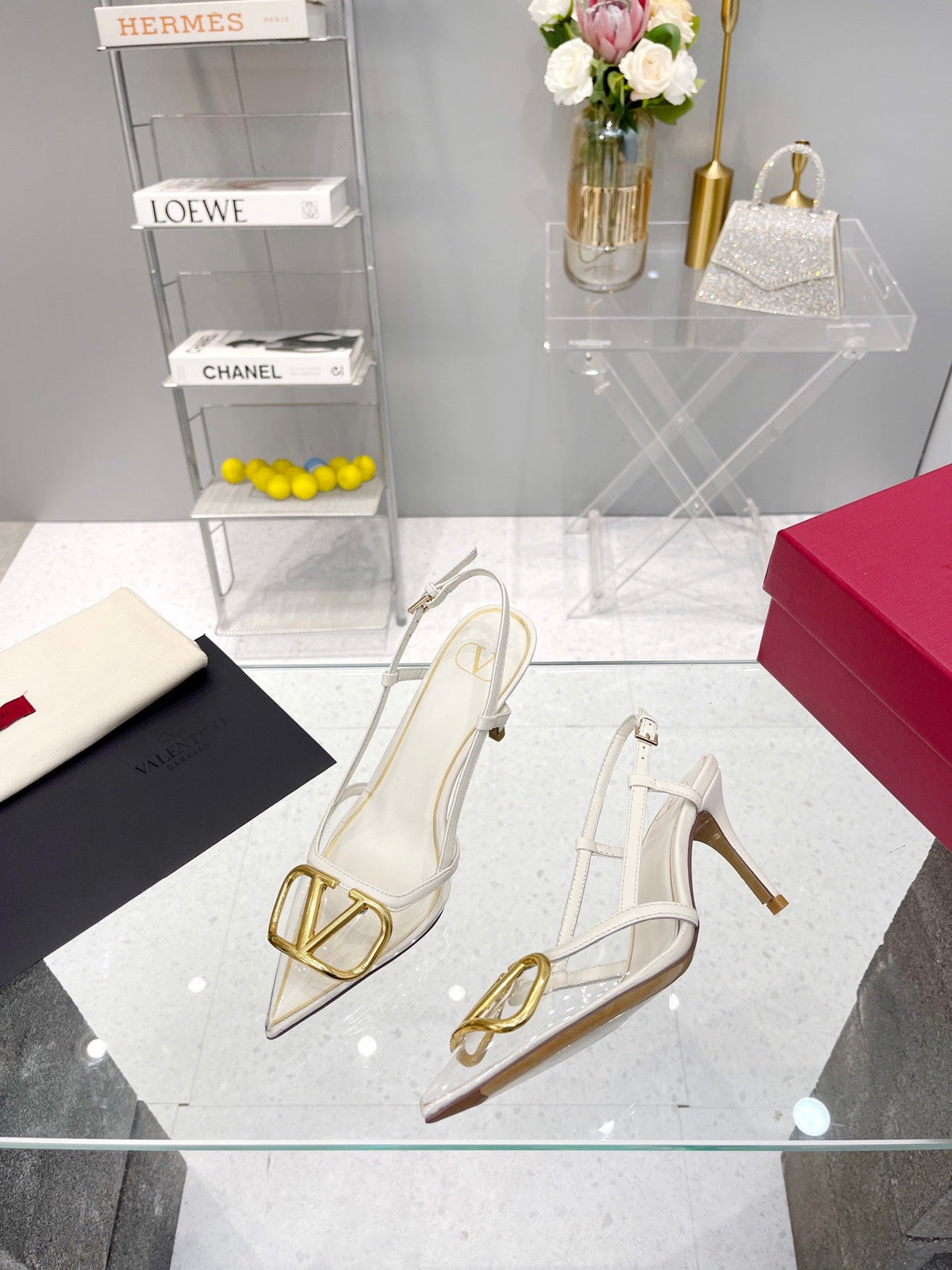CLEAR SLINGBACK HEELS – ELEGANT WHITE WITH GOLD LOGO DETAIL