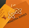 GOLD-TONE CRYSTAL FLOWER DROP EARRINGS