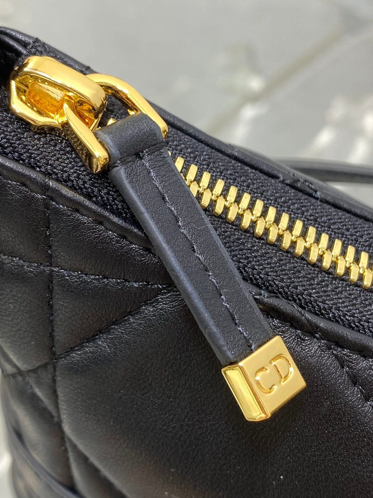 BLACK QUILTED LEATHER TOP-HANDLE BAG