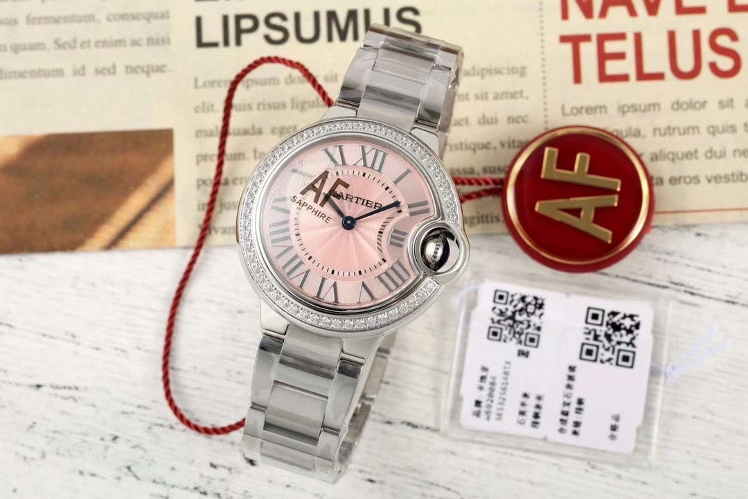 SILVER-TONE ROUND DIAL WATCH WITH PINK FACE