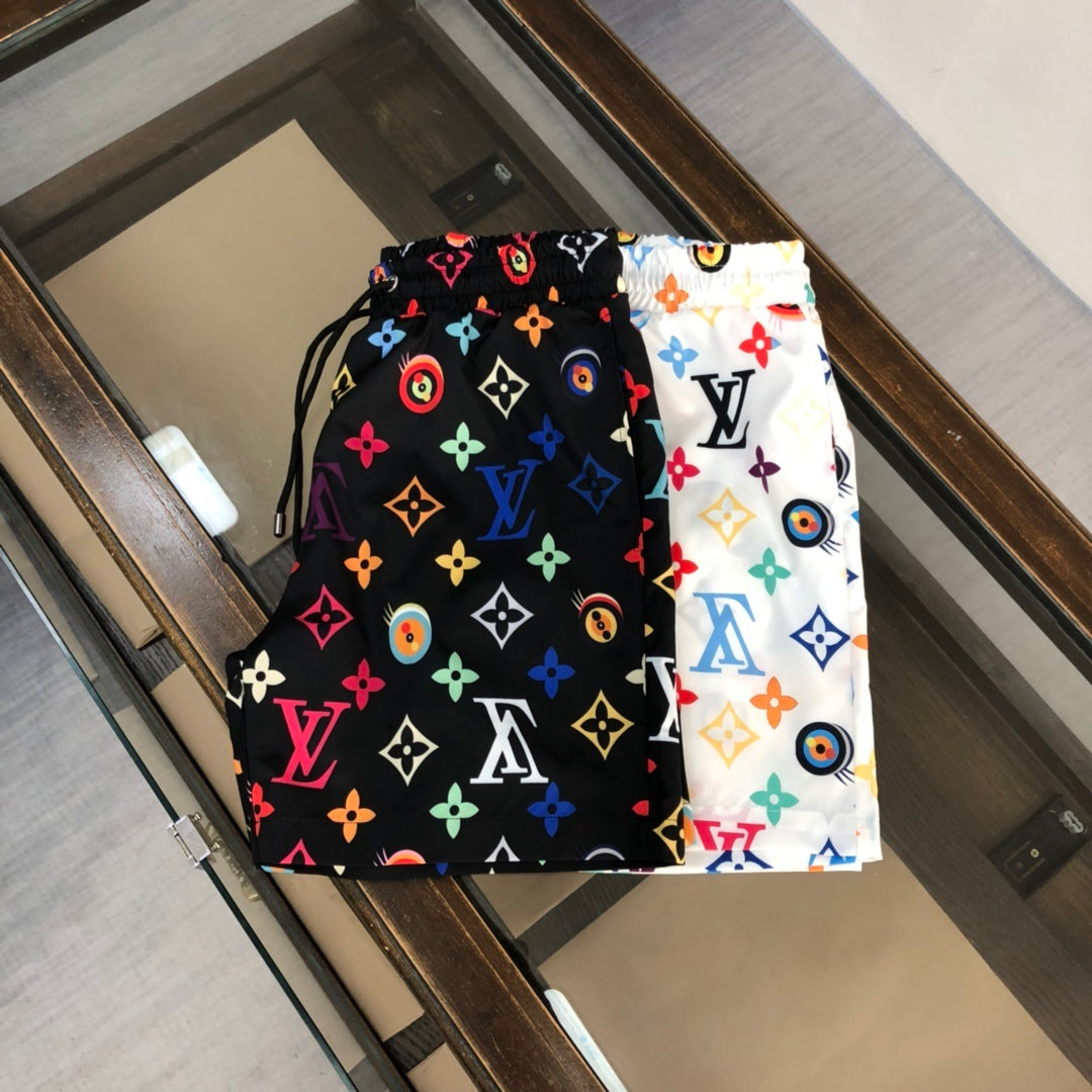 WHITE MULTICOLOR PRINT SWIM SHORTS