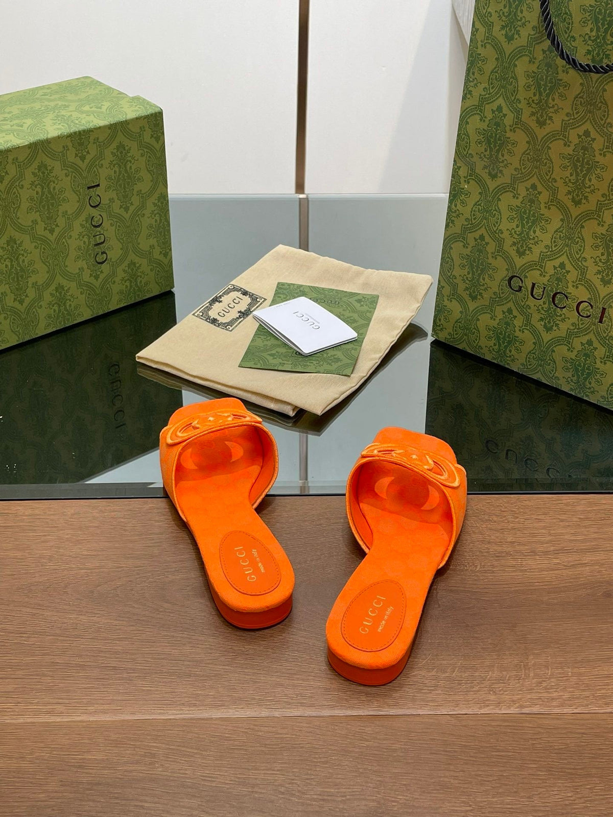 ORANGE EMBOSSED LOGO SLIDES