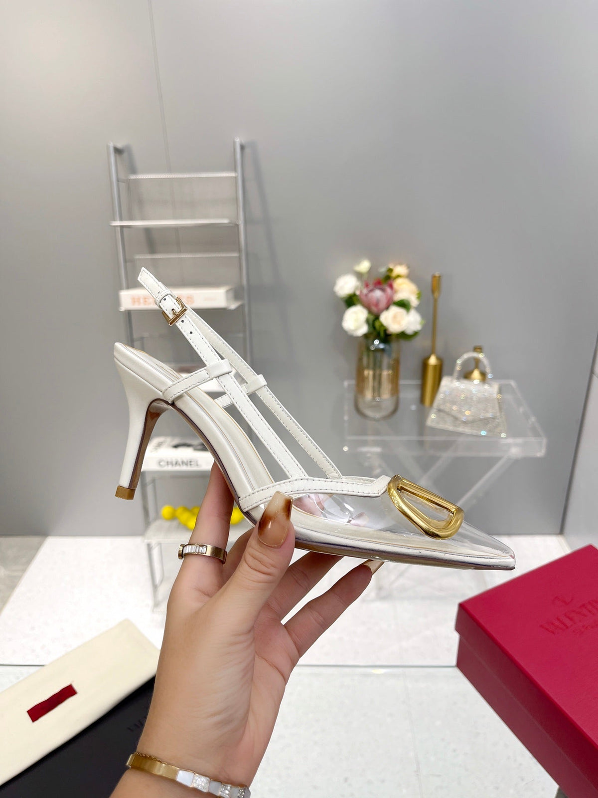 CLEAR SLINGBACK HEELS – ELEGANT WHITE WITH GOLD LOGO DETAIL